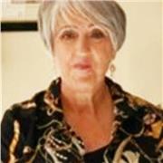 Fun which leads to natural learning.  Clear communicator having taught 4 to 12 ages